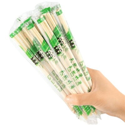 Des baguettes rondes jetables en bambou avec manche pour ménage/restaurant/hôtel.