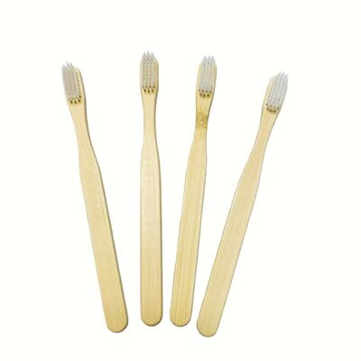 Brosse à dents jetable au charbon de bois biologique écologique et saine à 100 % en gros OEM, protection de l'environnement, brosse à dents plate pour adultes B&B fabriquée pour être dégradable